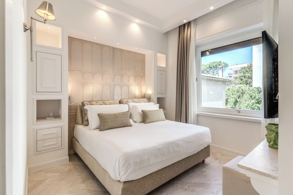 Deluxe Double Room, Courtyard View | In-room safe, soundproofing, iron/ironing board, free WiFi