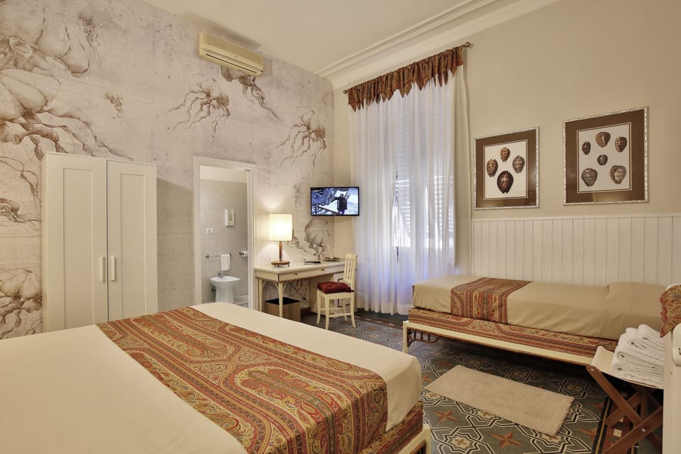 Standard Triple Room | Desk, WiFi (free), bed sheets