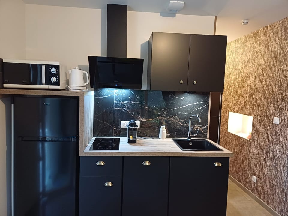 Family Apartment, 2 Bedrooms, Pool Access, Garden View | Living area | 43-inch flat-screen TV with digital channels