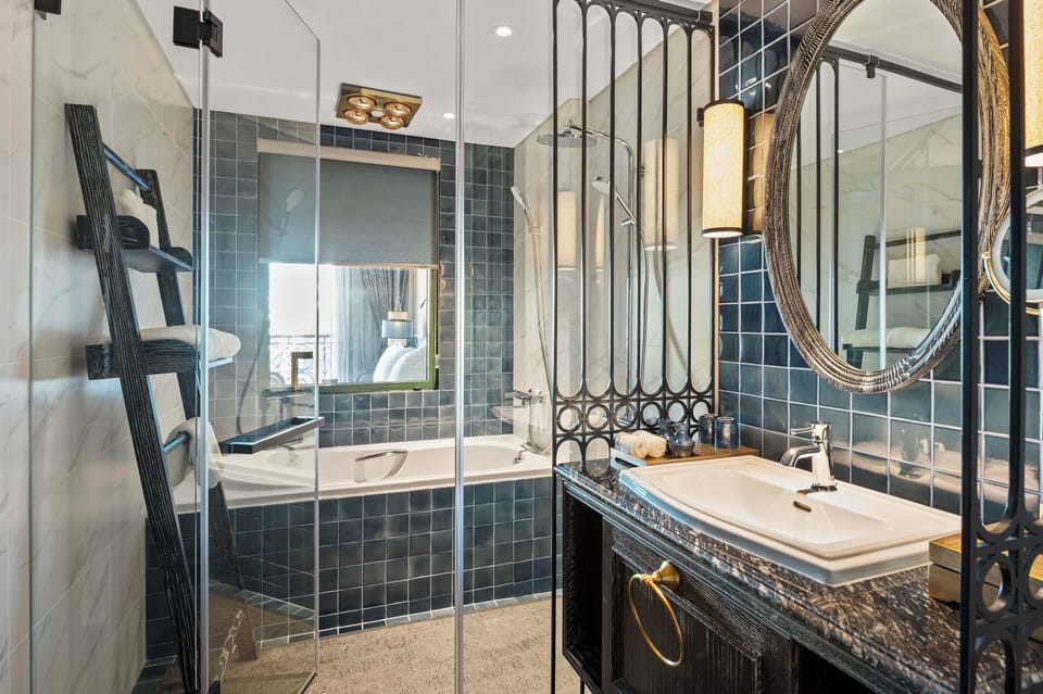 Designer toiletries, hair dryer, bathrobes, slippers