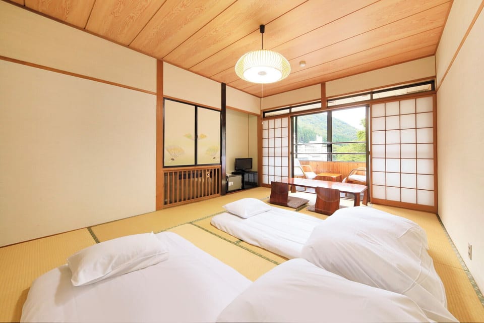 Mountain-side 10Tatami-mats: Standard Japanese-style room (Non-smoking, with shower) | WiFi (free), bed sheets