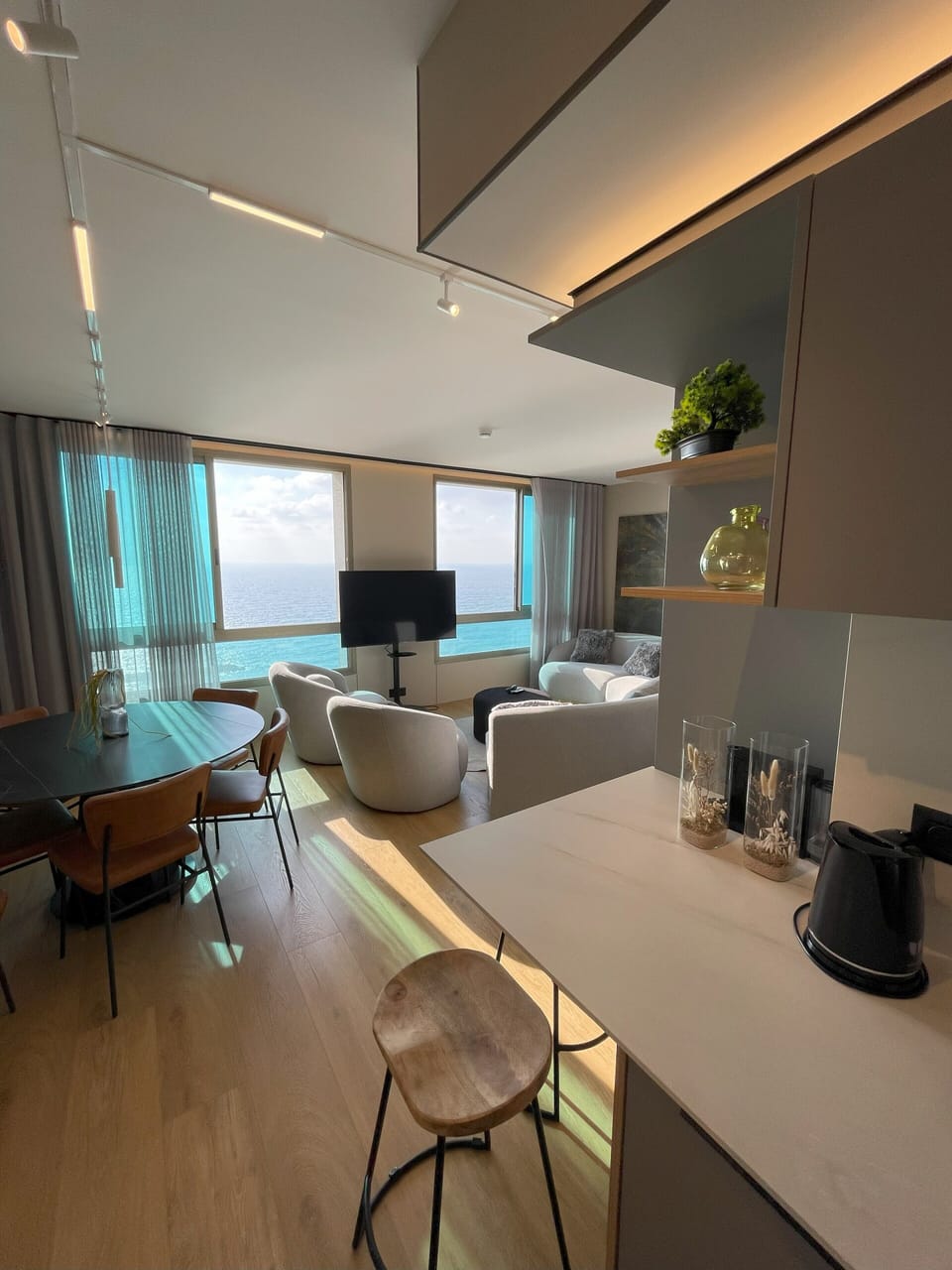 Luxury Apartment | Living area | 60-inch flat-screen TV with cable channels, pay movies