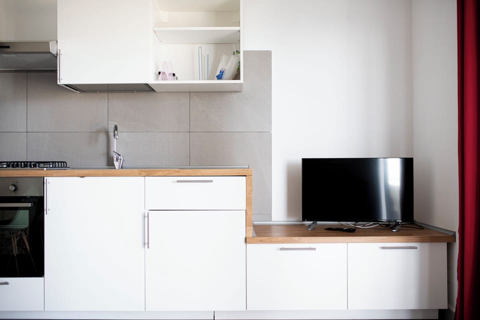 Tresino | Private kitchen | Stovetop, highchair, cookware/dishes/utensils, cleaning supplies