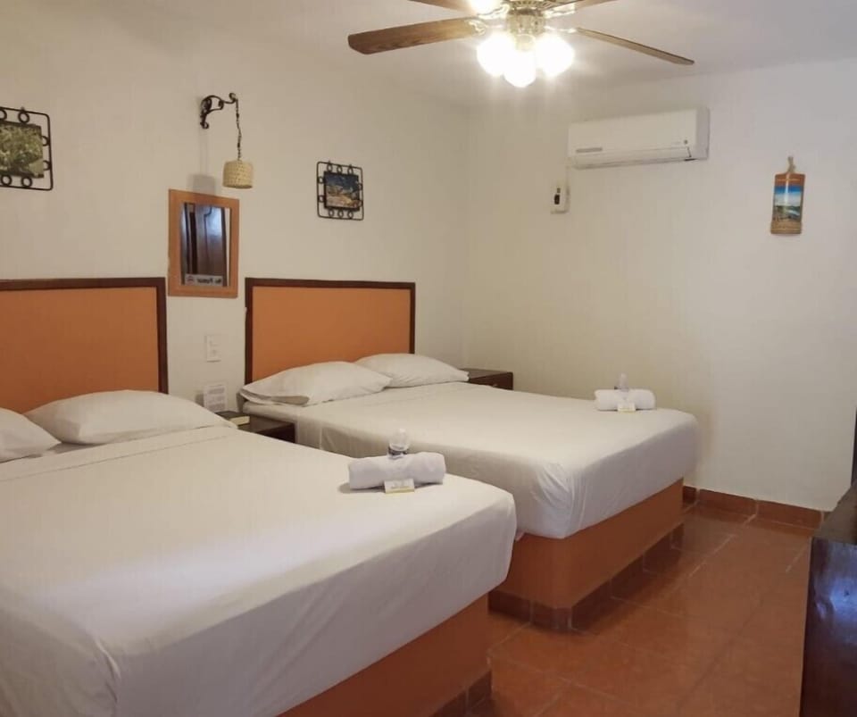 Basic Room, 2 Double Beds, Private Bathroom | Desk, laptop workspace, WiFi (free)