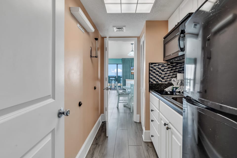 Family Condo, 1 Bedroom, Balcony, Partial Ocean View | Private kitchen | Fridge, microwave, stovetop, coffee/tea maker