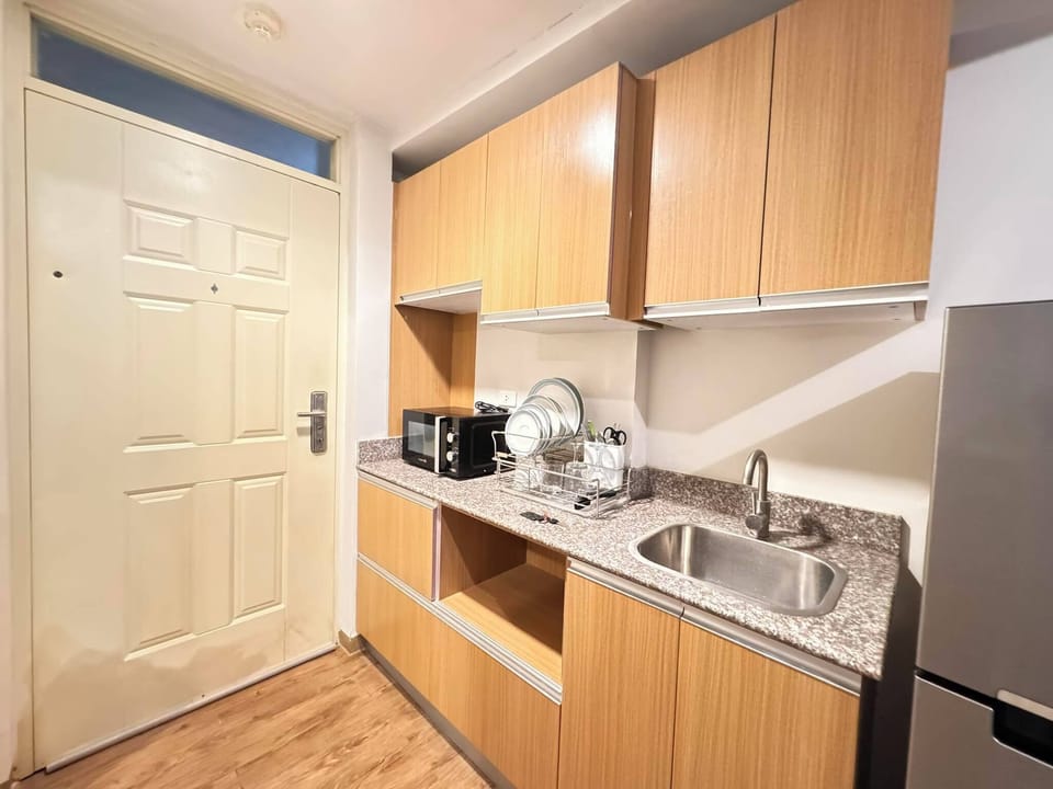 Exclusive Condo | Private kitchenette | Full-size fridge, microwave, toaster, kitchen island