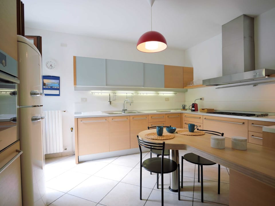 Villa | Private kitchen | Full-size fridge, oven, stovetop, dishwasher