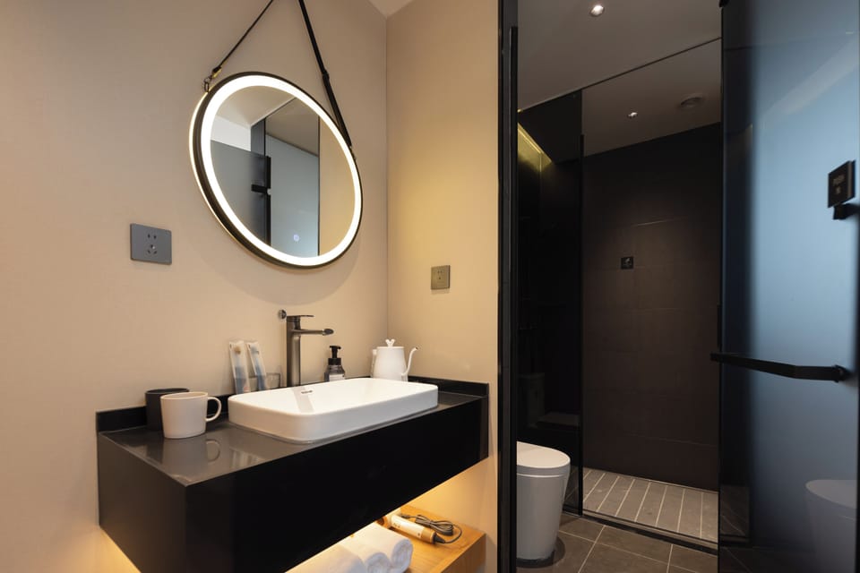 Elite Twin Room, Non Smoking | Bathroom | Towels