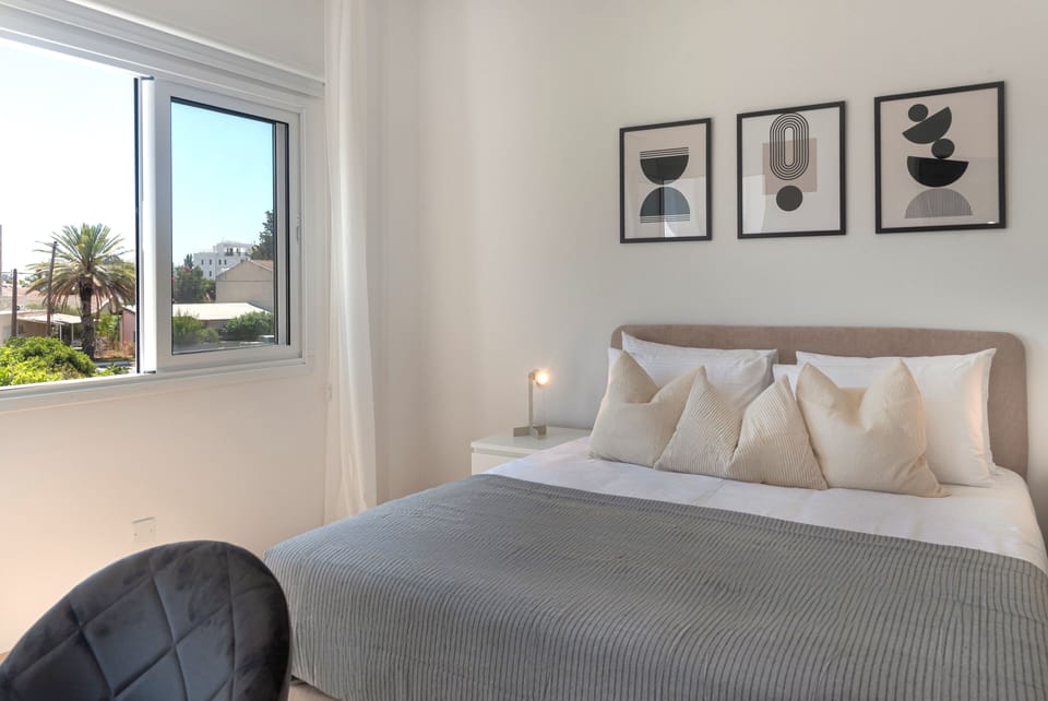 Luxury Apartment, City View | 2 bedrooms, in-room safe, blackout drapes, iron/ironing board
