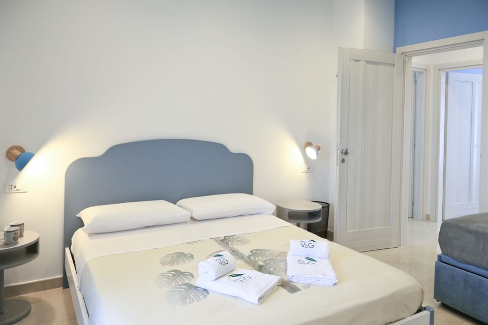 Family Room, Garden View | Desk, soundproofing, WiFi (free), bed sheets