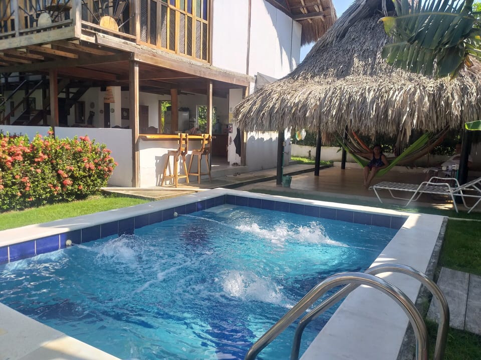 Outdoor pool, open 8:00 AM to 8:00 PM, pool umbrellas, sun loungers