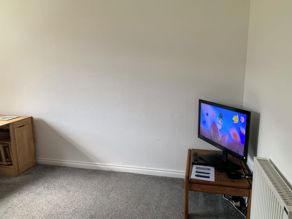 30-inch LED TV with digital channels, books