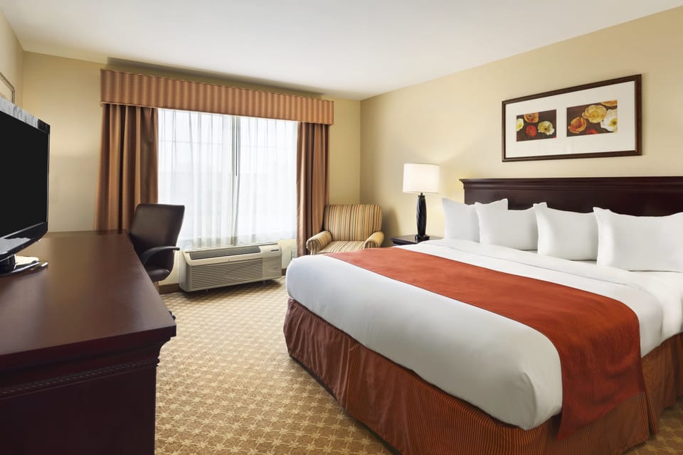 Premium bedding, down comforters, pillowtop beds, desk