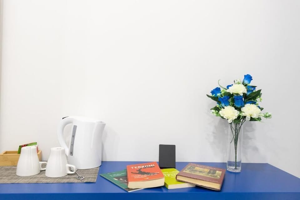 Eco-friendly toiletries, hair dryer, slippers, bidet