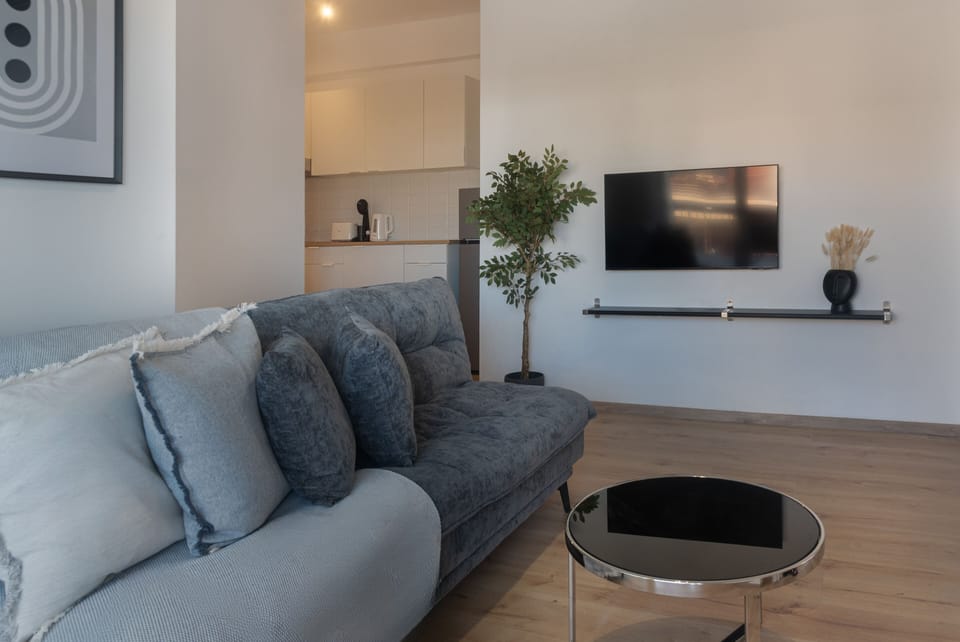 Luxury Apartment, City View | 2 bedrooms, in-room safe, blackout drapes, iron/ironing board