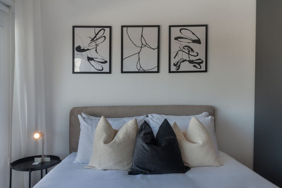 Luxury Apartment, City View | 2 bedrooms, in-room safe, blackout drapes, iron/ironing board