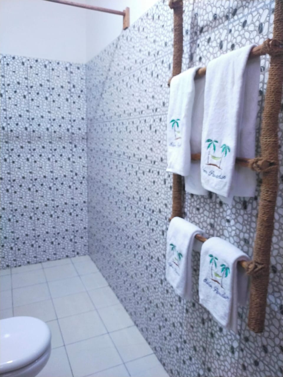 Family Quadruple Room, Multiple Beds, Balcony, Garden View | Bathroom | Shower, rainfall showerhead, towels, soap