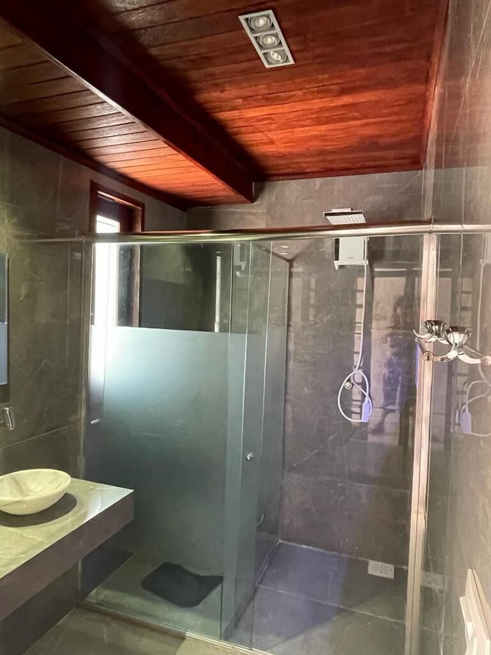 Shower, towels, soap, toilet paper
