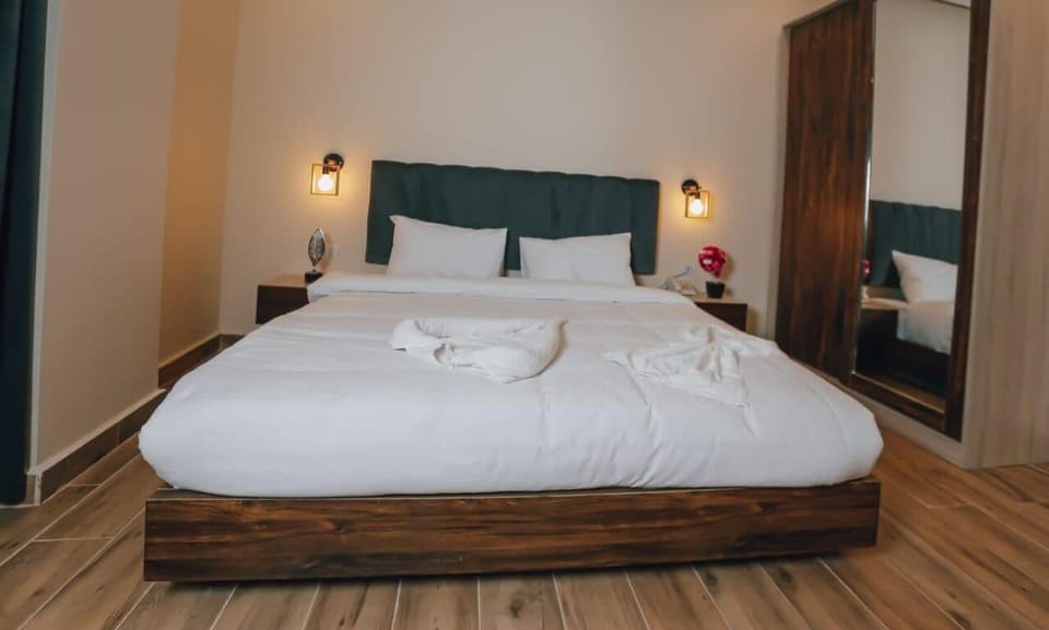 Deluxe Double Room, Balcony, Mountain View | Blackout drapes, iron/ironing board, free WiFi