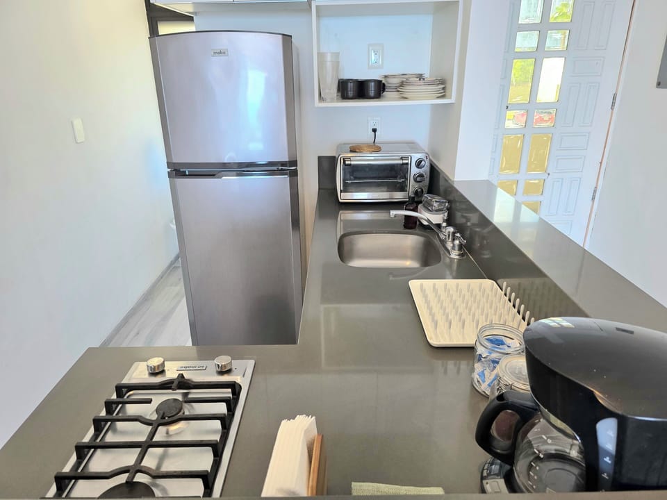 Apartment, Partial Ocean View | Private kitchen | Toaster