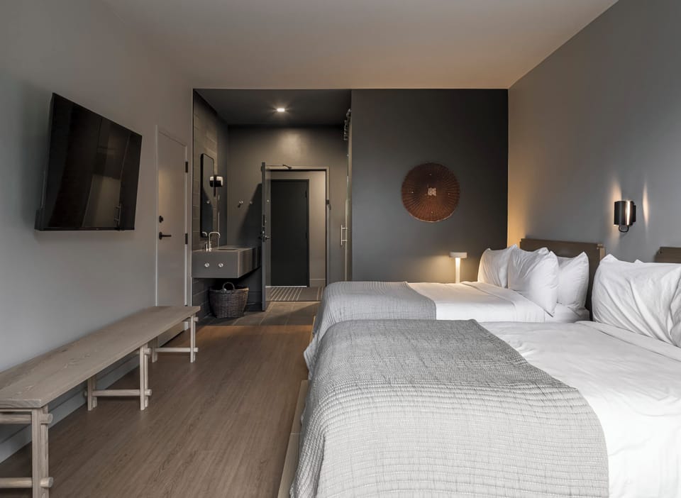 Premium bedding, down comforters, pillowtop beds, in-room safe