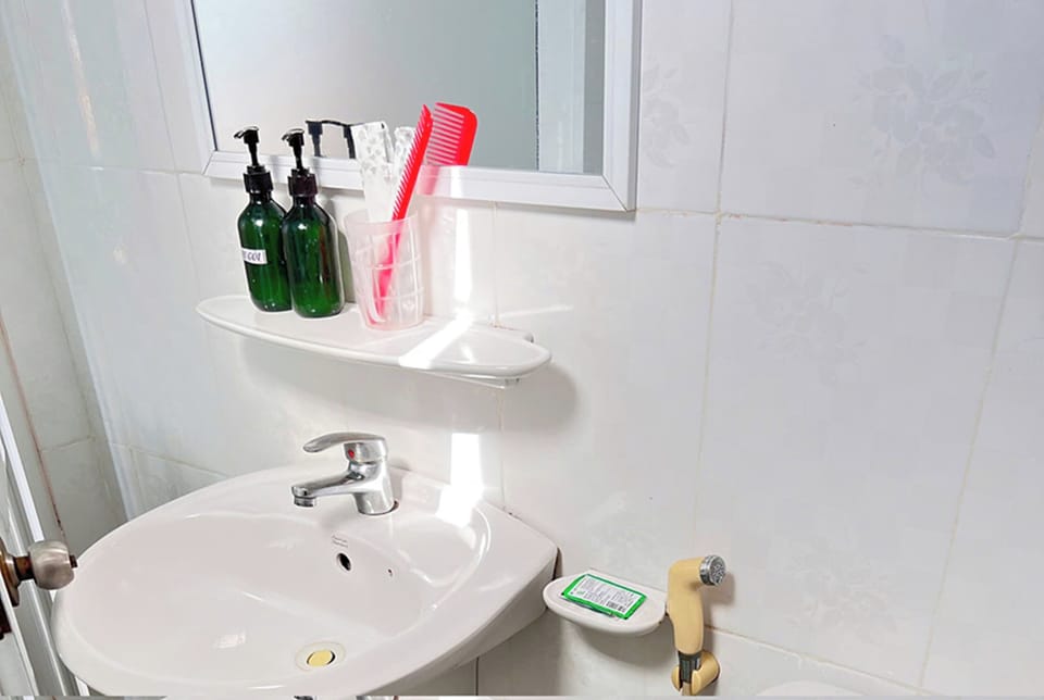 Shower, rainfall showerhead, designer toiletries, hair dryer