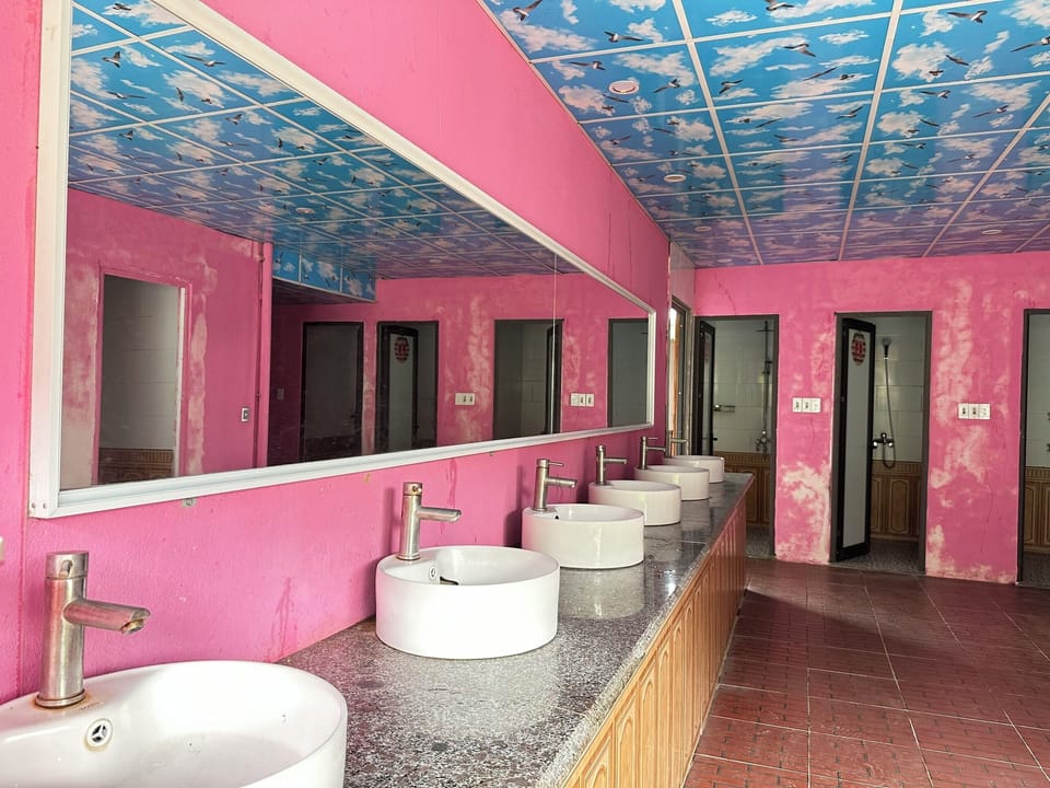 Basic Shared Dormitory, Garden View | Bathroom | Hair dryer, slippers, bidet