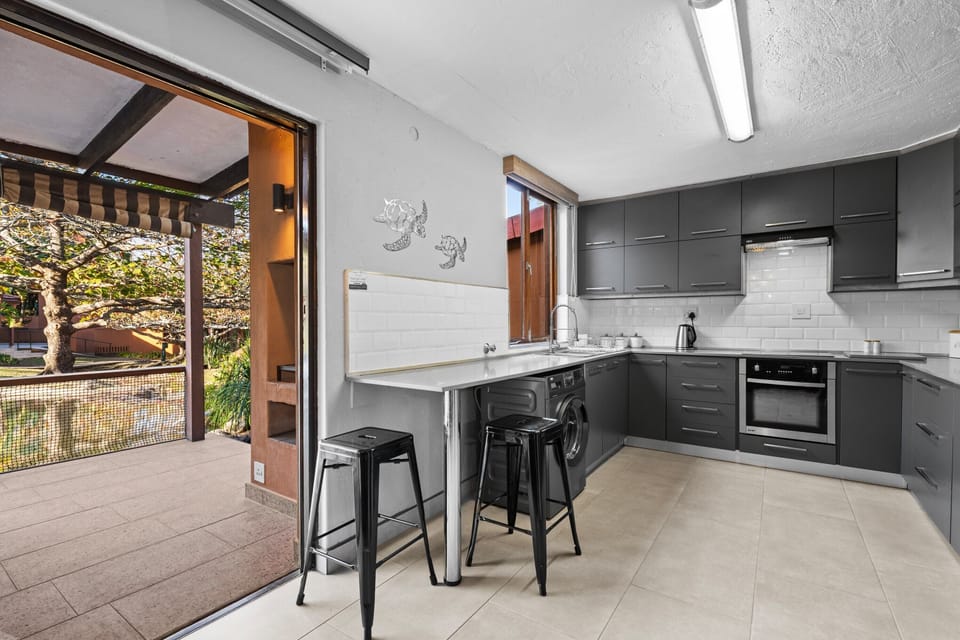 Villa | Private kitchen | Electric kettle, highchair