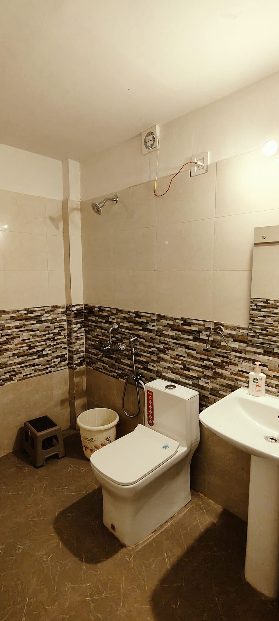 Shower, rainfall showerhead, eco-friendly toiletries, towels