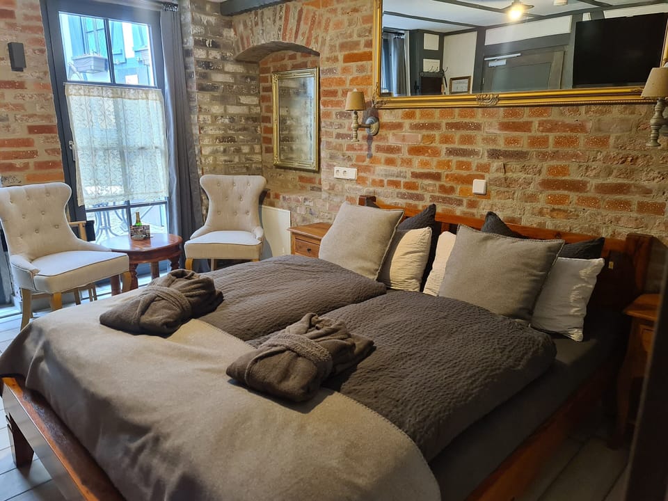 Classic Double Room, Courtyard View | In-room safe, desk, laptop workspace, blackout drapes