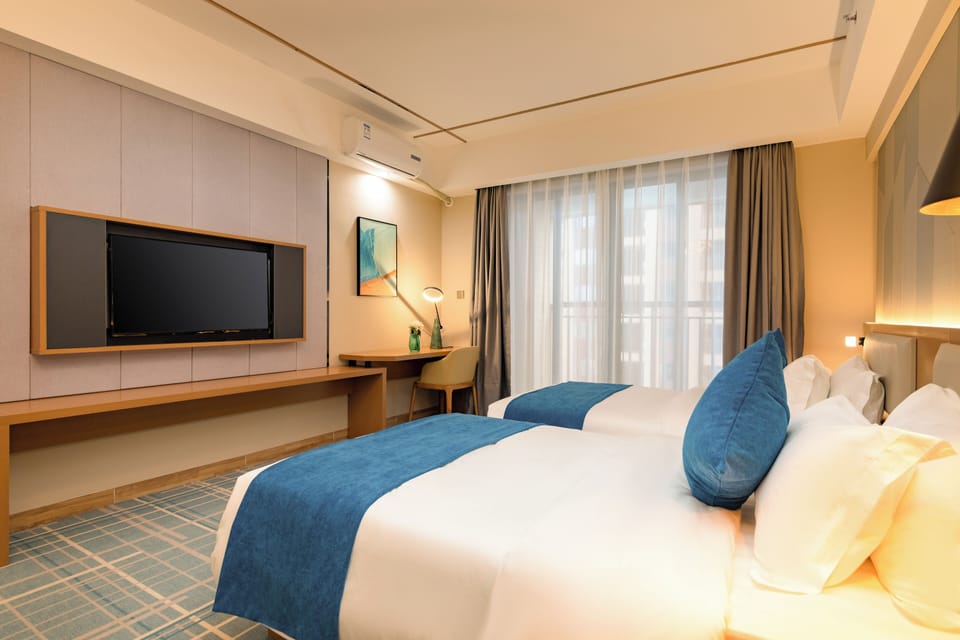 Basic Twin Room, Balcony, City View | Desk, laptop workspace, blackout drapes, iron/ironing board