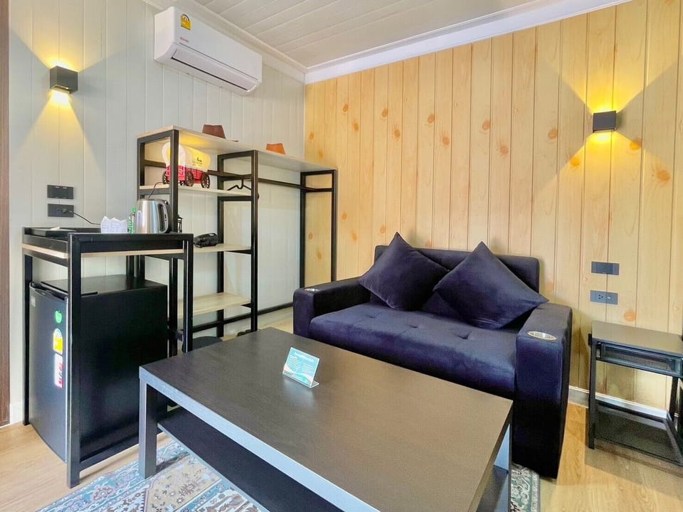 Superior Twin Room, Resort View | Living area | TV