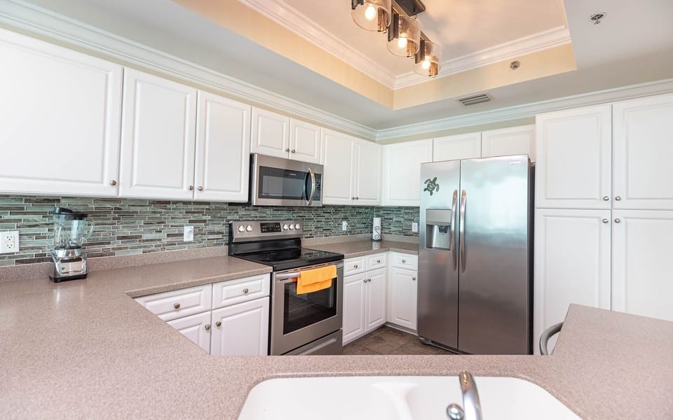 Condo, 2 Bedrooms | Private kitchen | Coffee/tea maker, fridge, oven