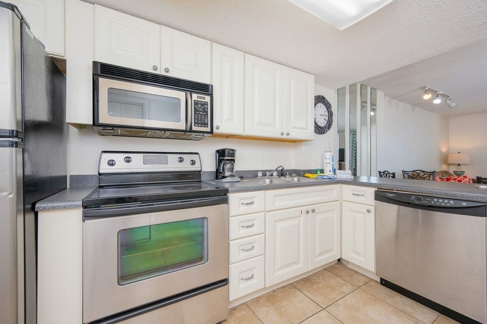 Condo, 2 Bedrooms | Private kitchen | Coffee/tea maker, fridge, oven