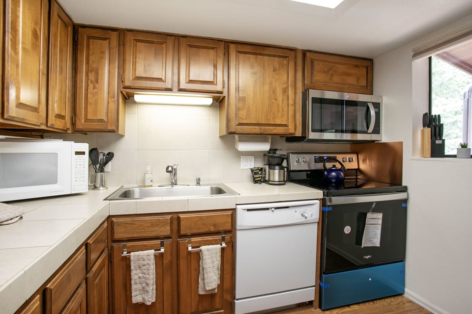 Condo, 2 Bedrooms | Private kitchen | Coffee/tea maker, fridge, oven, toaster