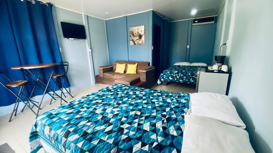 Basic Quadruple Room, 2 Double Beds, Non Smoking | Free WiFi, bed sheets