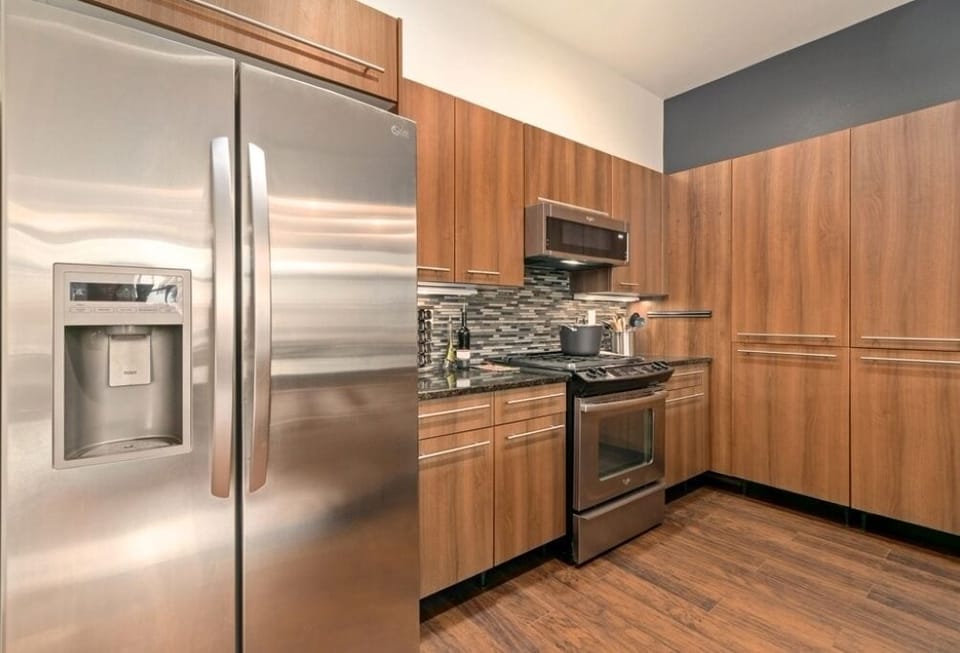 Condo, Multiple Beds, Patio (803 Blondel St #101) | Private kitchen | Fridge, microwave, oven, stovetop