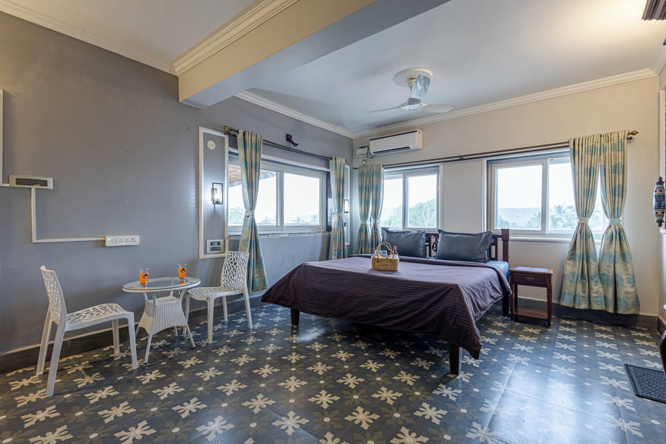 Deluxe Suite, Balcony, Hill View | 1 bedroom, desk, laptop workspace, soundproofing
