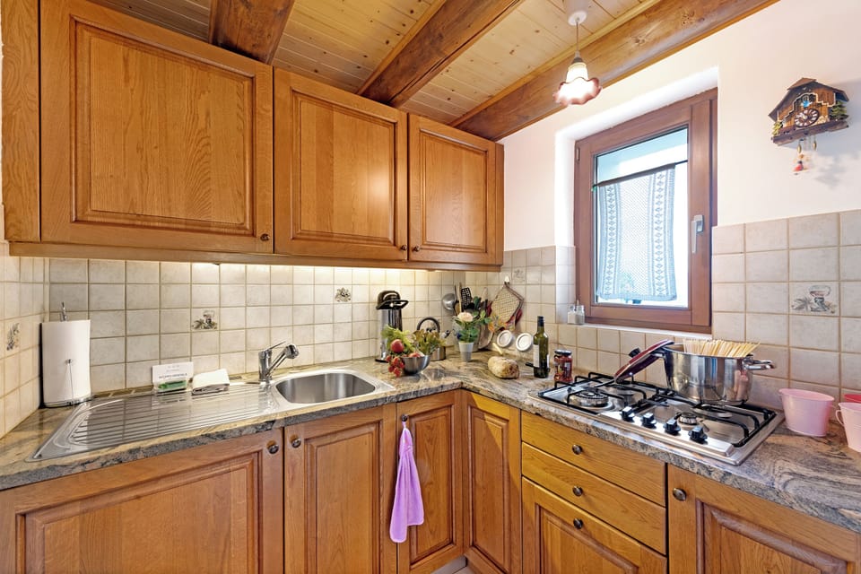 Fridge, stovetop, coffee/tea maker, cookware/dishes/utensils