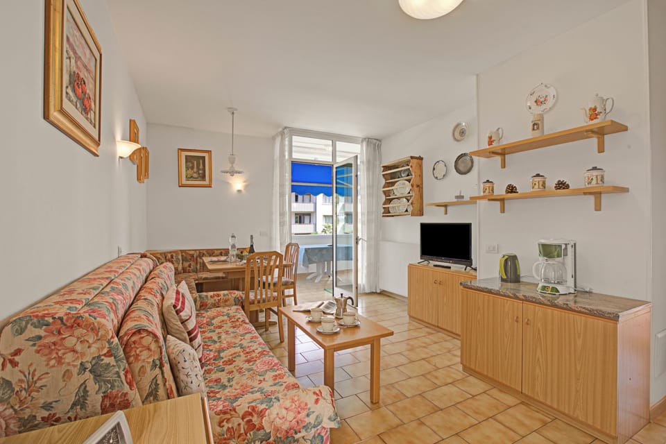 Standard Apartment, Multiple Bedrooms (Garden & Surf By Rossana) | Living area | Flat-screen TV