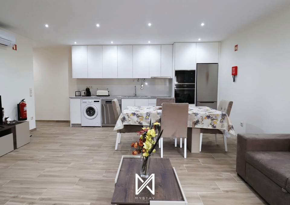 Superior Apartment | Living area | 40-inch flat-screen TV with satellite channels