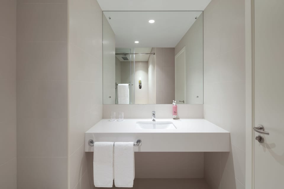 Shower, rainfall showerhead, eco-friendly toiletries, hair dryer