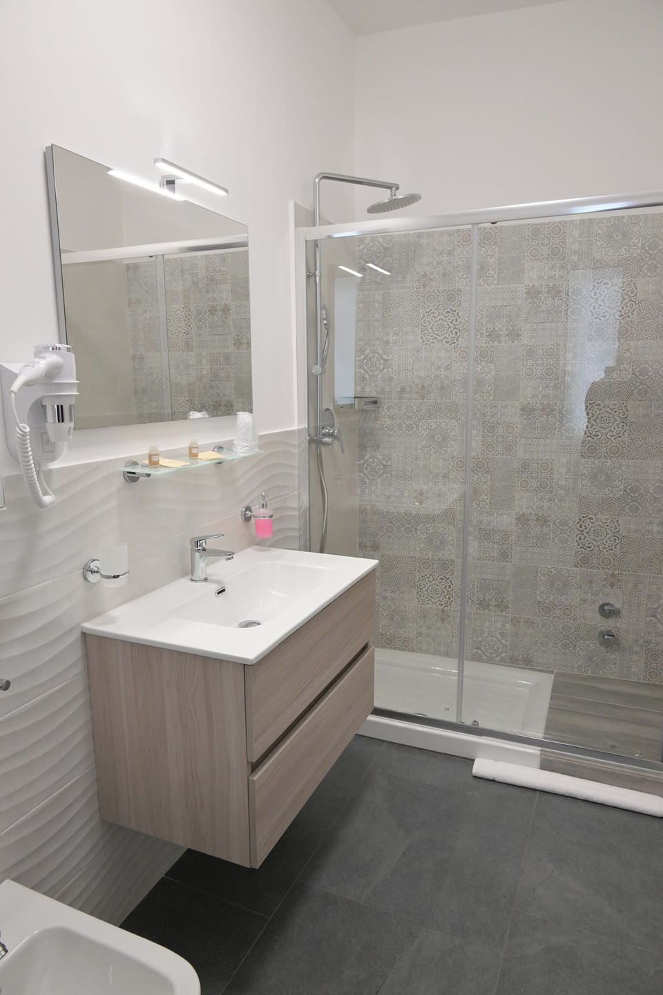 Comfort Room, City View | Bathroom | Shower, rainfall showerhead, hair dryer, bidet