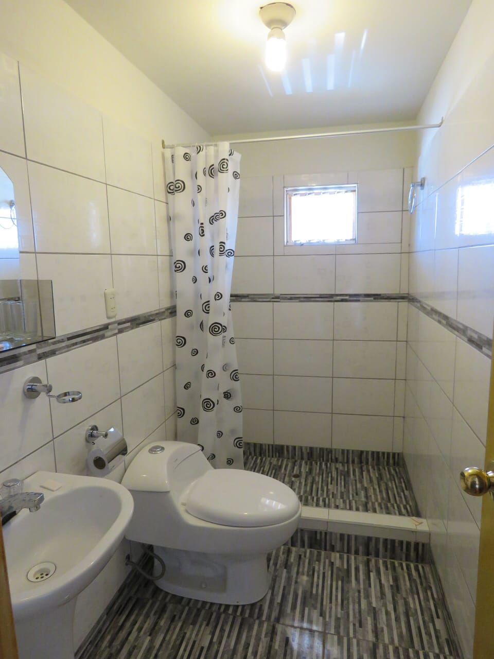Shower, rainfall showerhead, towels, soap