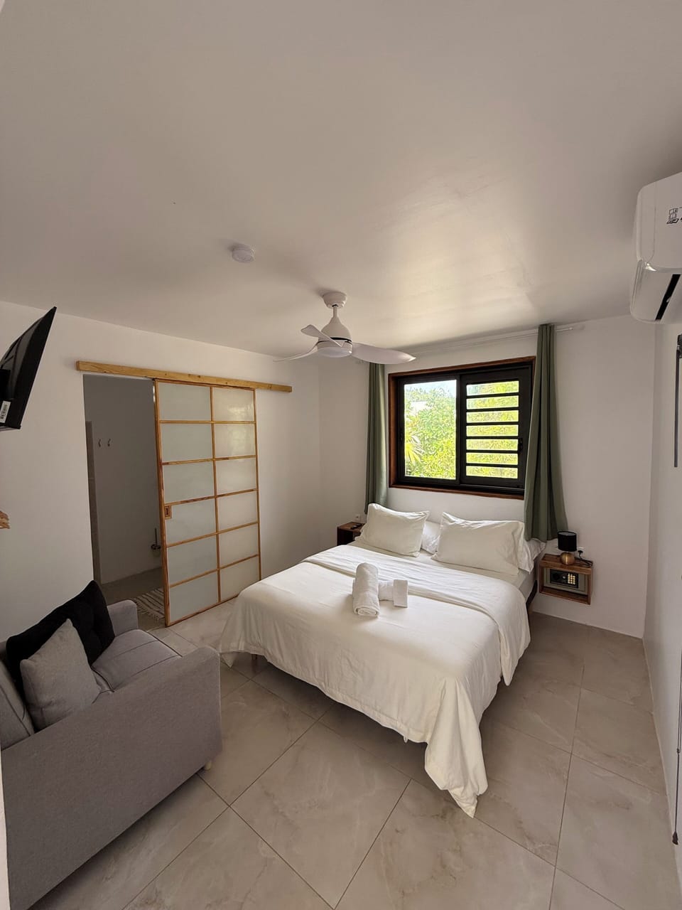 Down comforters, in-room safe, blackout drapes