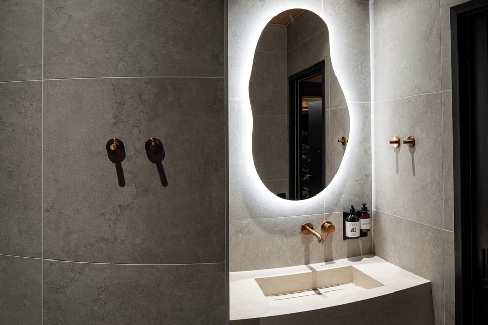 Aurora Room | Bathroom | Shower, rainfall showerhead, hair dryer, heated floors