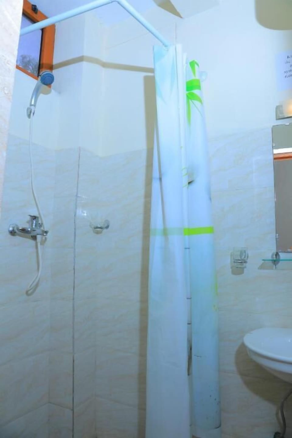 Standard Double Room | Bathroom | Shower, slippers, towels, soap