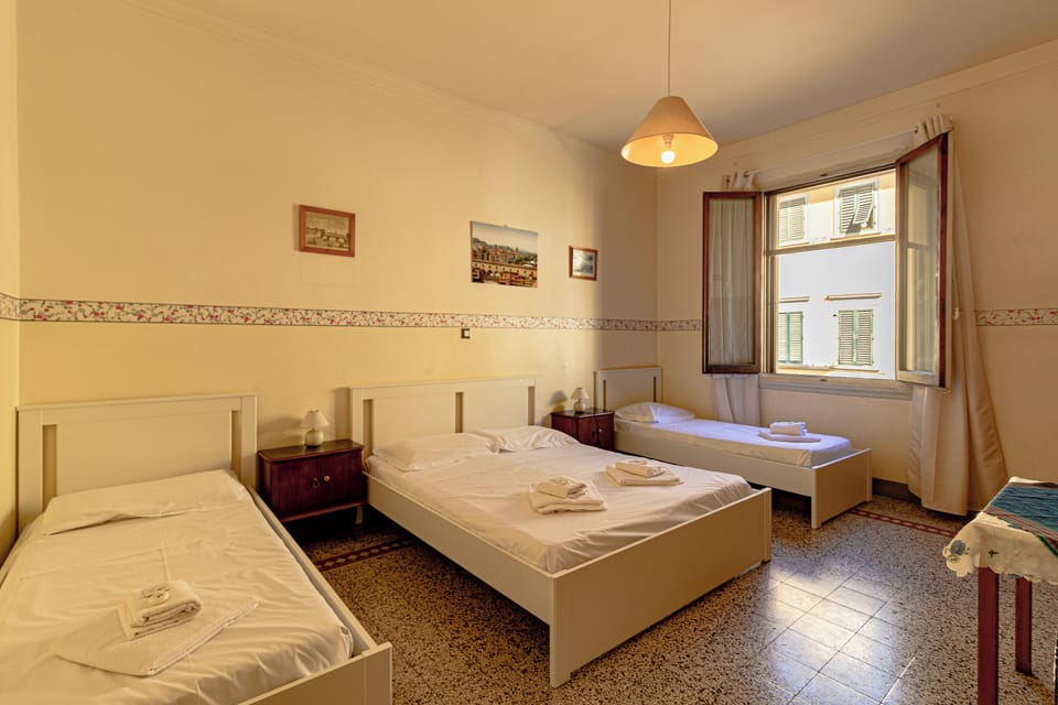 Quadruple Room - Shared Bathroom | Down comforters, desk, laptop workspace, soundproofing