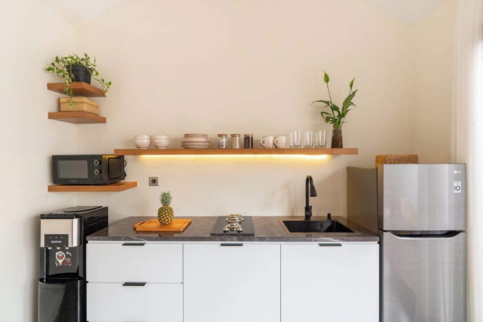 Premium Villa, Pool View | Private kitchen | Full-size fridge, microwave, stovetop, electric kettle