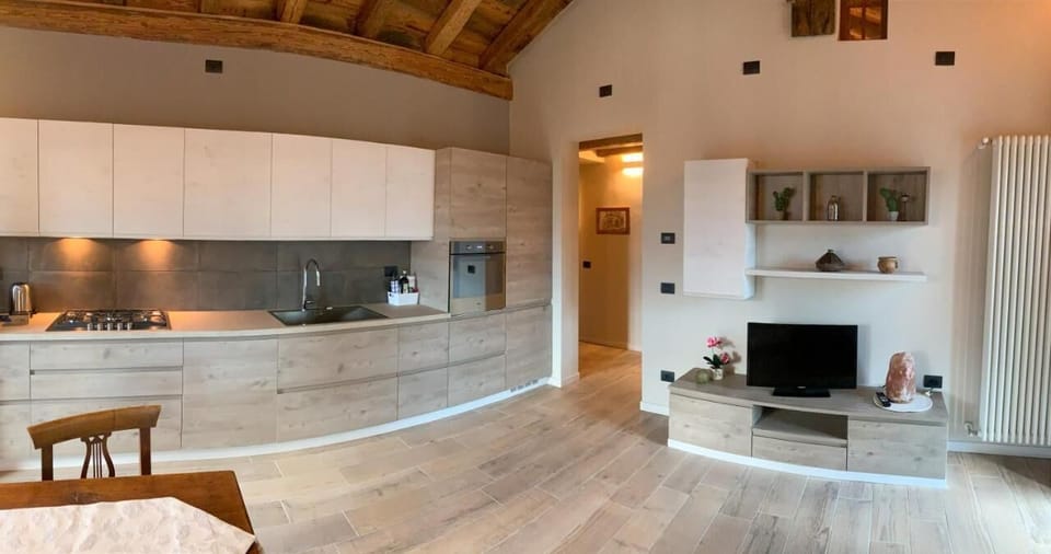 Superior Apartment, Lake View | Private kitchen | Full-size fridge, oven, stovetop, dishwasher